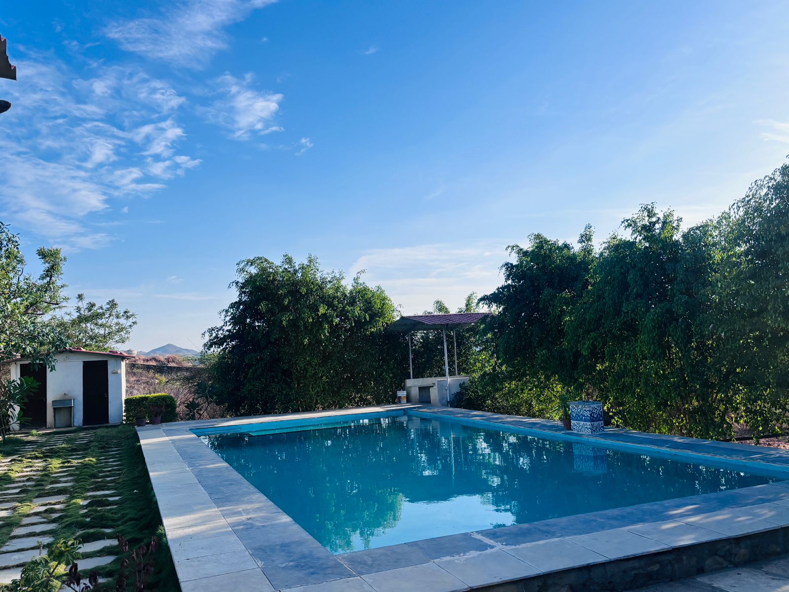 Wide view of blue swimming pool